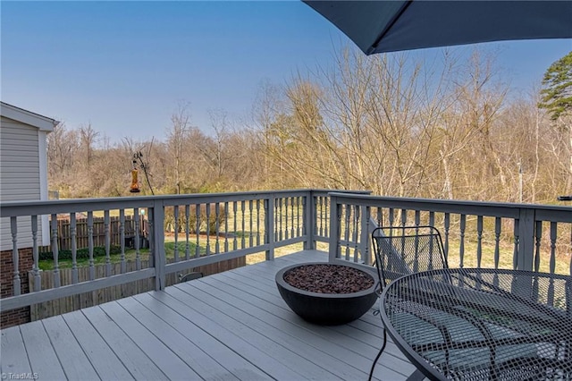 wooden deck with outdoor dining area