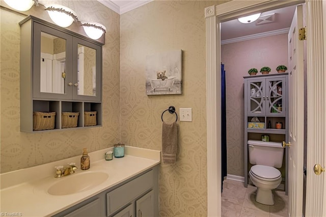 bathroom with visible vents, toilet, wallpapered walls, and vanity