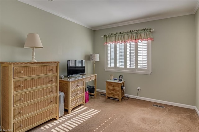 carpeted home office with visible vents, baseboards, and ornamental molding