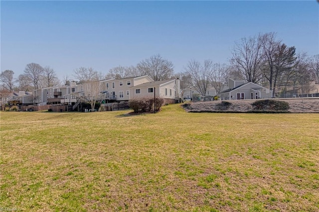 view of yard featuring a residential view