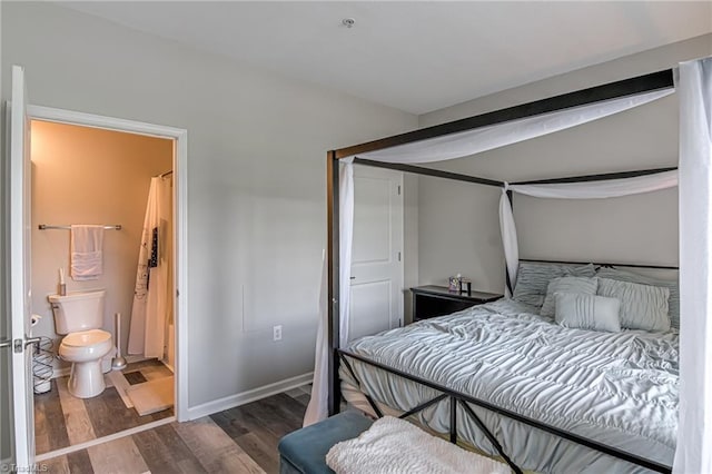 6801 Hanesbrook Cir Unit 104, Clemmons, NC 27012 - bedroom featuring wood finished floors and baseboards
