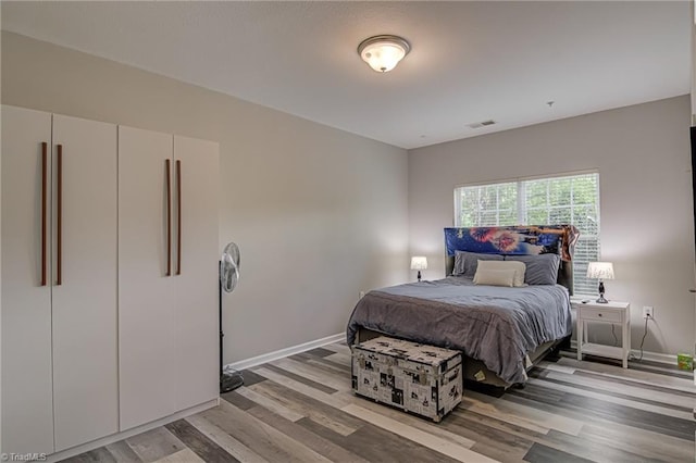 6801 Hanesbrook Cir Unit 104, Clemmons, NC 27012 - bedroom with light wood-style flooring and baseboards