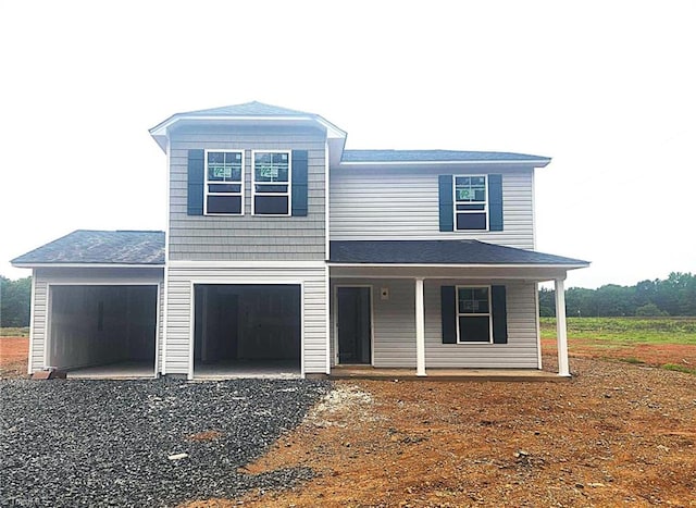 2866 Tysinger Rd, Denton, NC 27239 - view of front of home featuring a porch, driveway, and a garage