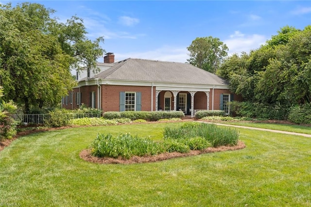 view of front of home with a front yard