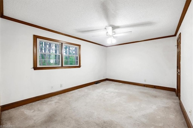 206 Swaim Ct, Salisbury, NC 28147 - carpeted empty room featuring a textured ceiling, ornamental molding, a ceiling fan, and baseboards