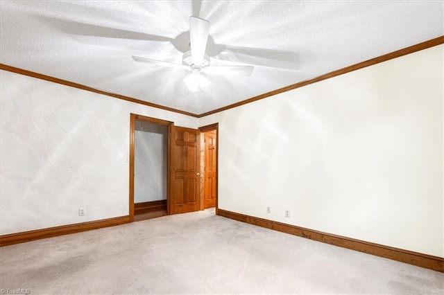 206 Swaim Ct, Salisbury, NC 28147 - carpeted empty room with ornamental molding, baseboards, ceiling fan, and a textured ceiling