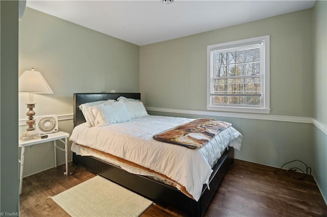 bedroom featuring dark wood-type flooring