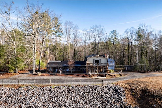 view of front of house featuring a deck