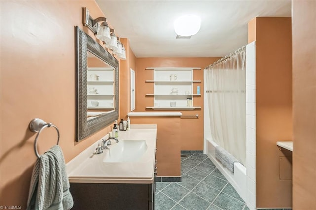 bathroom featuring built in features, vanity, and shower / bath combo with shower curtain