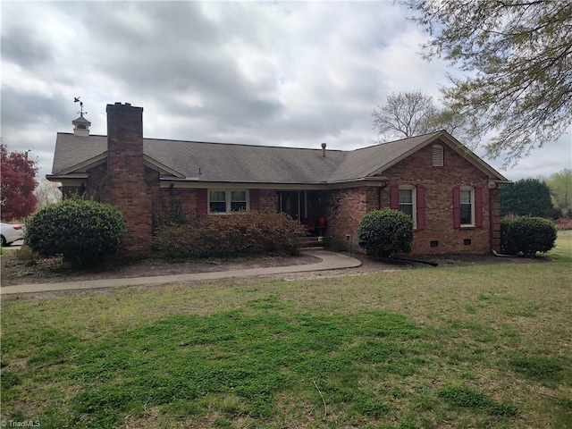 345 Anderson Rd, Eden, NC 27288 - ranch-style home featuring a front yard, brick siding, a chimney, and a shingled roof