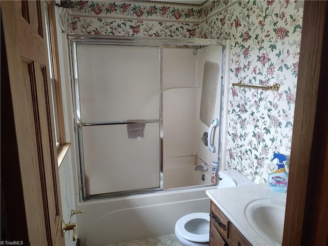 345 Anderson Rd, Eden, NC 27288 - full bath with combined bath / shower with glass door, toilet, vanity, and wallpapered walls