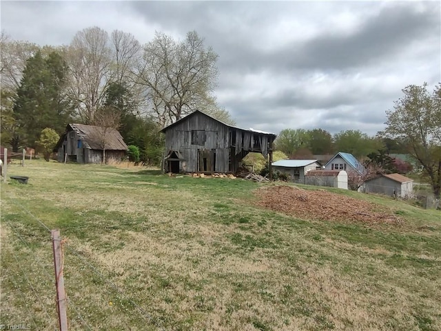 345 Anderson Rd, Eden, NC 27288 - view of yard with a barn and an outdoor structure