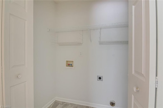 261 Williamsgate Ct, Winston-Salem, NC 27107 - washroom with hookup for an electric dryer, washer hookup, baseboards, and light wood-type flooring