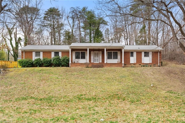 ranch-style home featuring a front lawn, brick siding, and crawl space