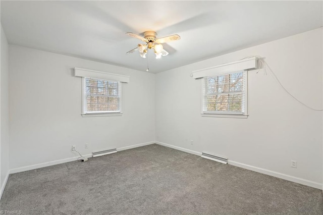 empty room featuring visible vents, baseboards, carpet, and a ceiling fan