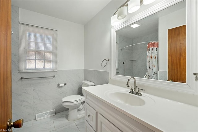 bathroom featuring vanity, a shower with curtain, visible vents, toilet, and marble finish floor