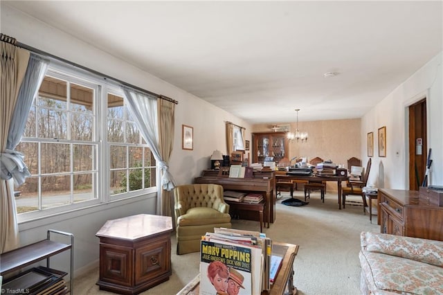 interior space with a chandelier and light colored carpet