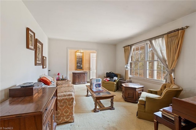 living area featuring light carpet and radiator