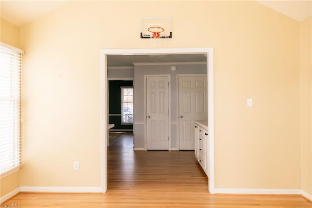 hallway with light wood-type flooring