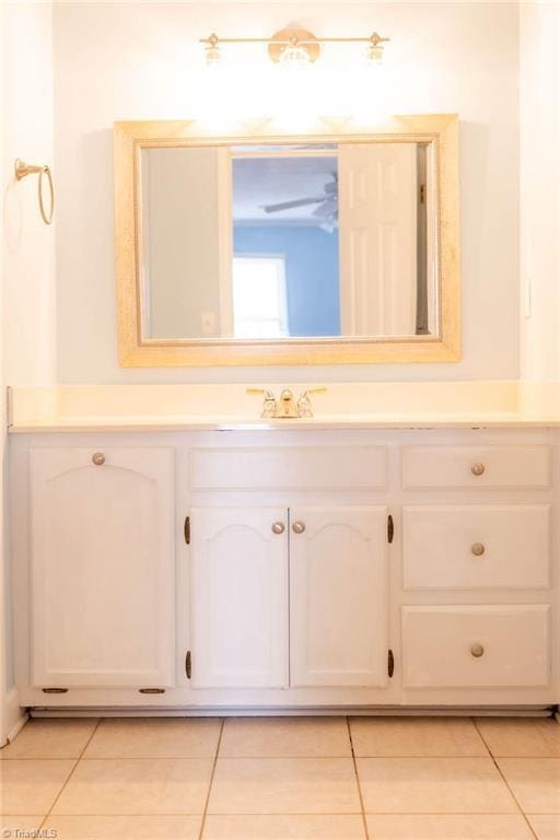 bathroom with vanity and tile patterned floors