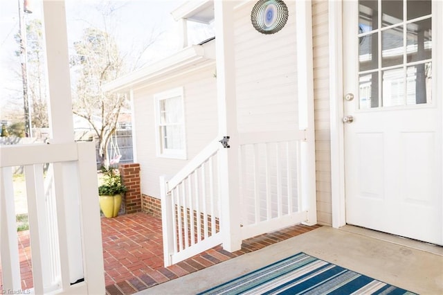 entrance to property with a patio area