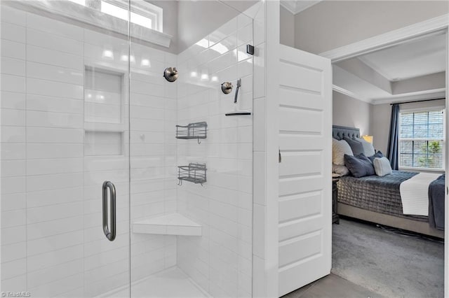 full bathroom with a stall shower, a wealth of natural light, ornamental molding, and ensuite bathroom