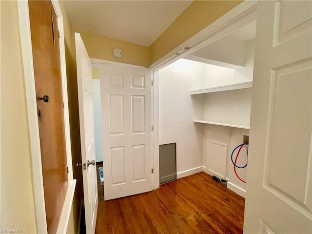 laundry area featuring hookup for a washing machine and hardwood / wood-style flooring