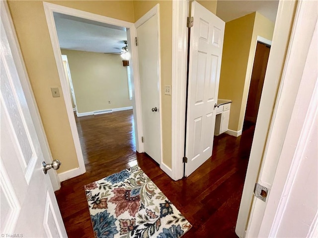 hall featuring dark hardwood / wood-style floors