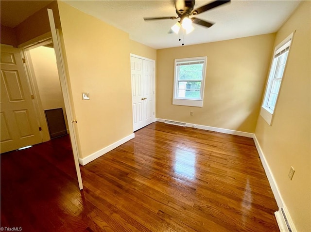 unfurnished bedroom with hardwood / wood-style flooring and ceiling fan