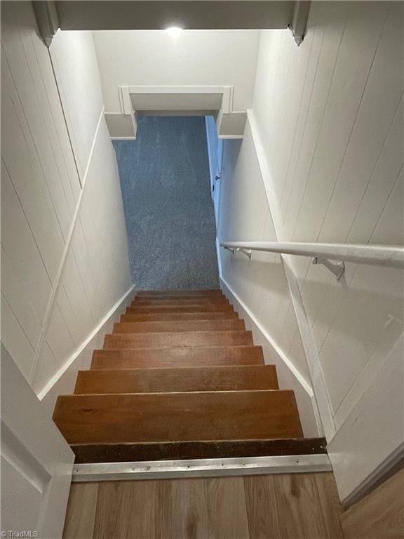 stairway with carpet floors