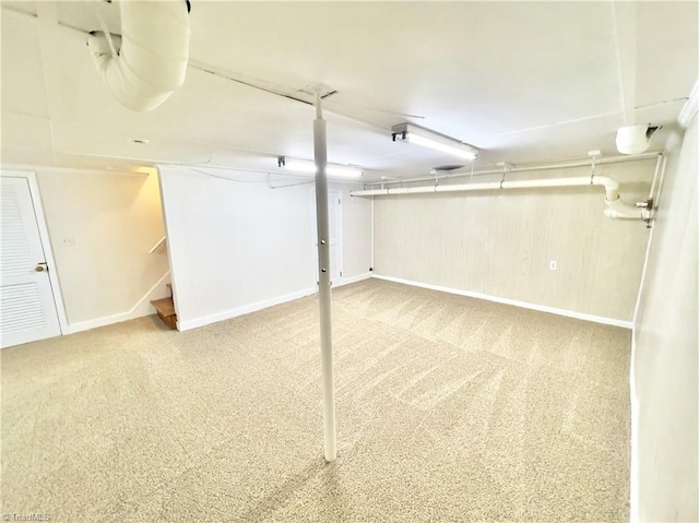 basement with carpet flooring