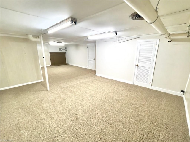 basement with carpet flooring