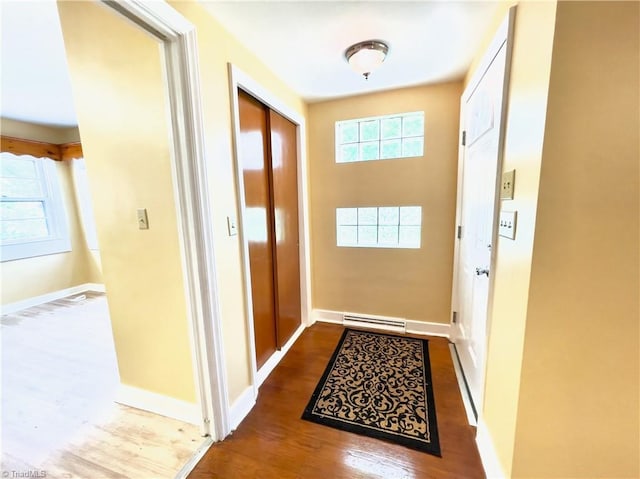 doorway to outside with hardwood / wood-style floors