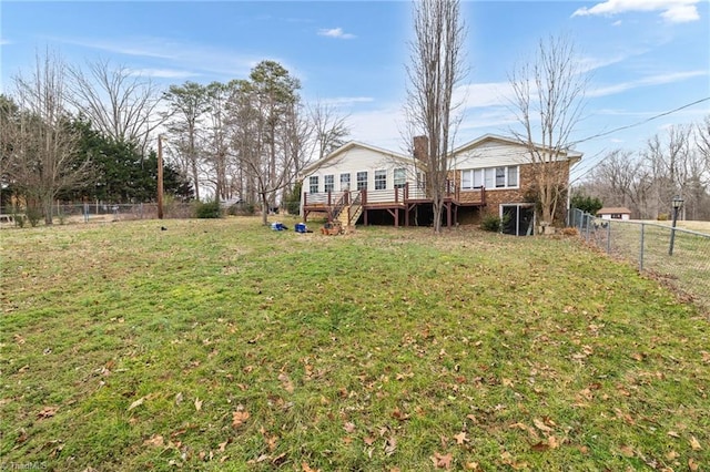 view of yard with a wooden deck