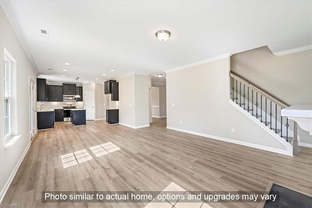 unfurnished living room featuring stairs, baseboards, ornamental molding, and light wood finished floors