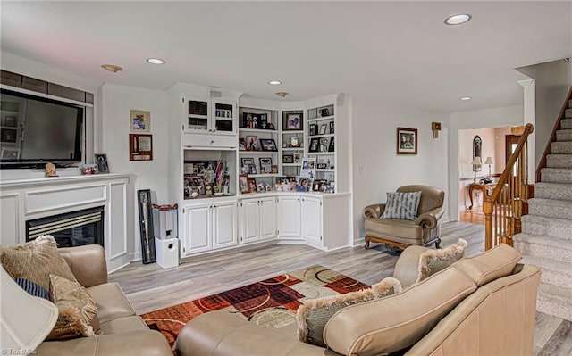 living room with light hardwood / wood-style floors