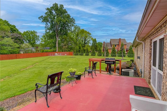 view of patio / terrace with central air condition unit and a grill