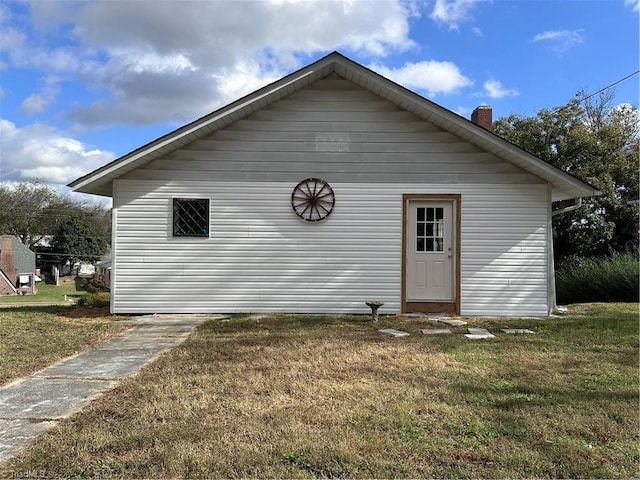 exterior space with a yard