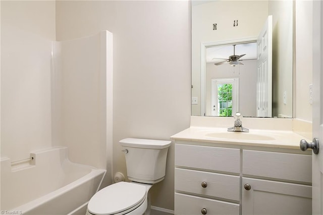 3820 Wayfarer Dr, Greensboro, NC 27410 - bathroom with toilet, vanity, a ceiling fan, and shower / washtub combination