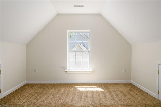 3820 Wayfarer Dr, Greensboro, NC 27410 - additional living space featuring carpet, vaulted ceiling, and baseboards