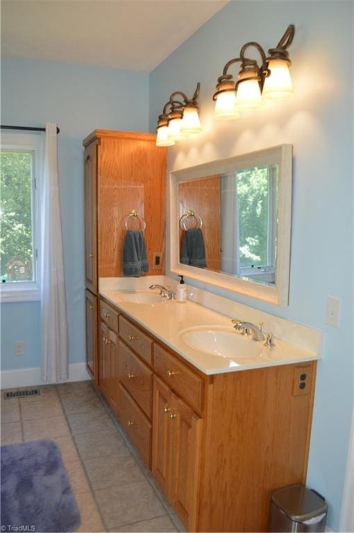 198 Savannah Ln, Mount Airy, NC 27030 - full bath featuring double vanity, tile patterned floors, and baseboards