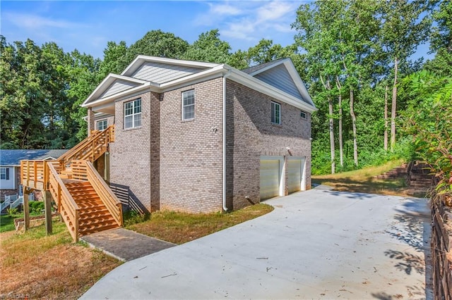 view of side of property featuring a garage