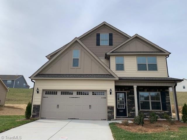 craftsman house with a garage