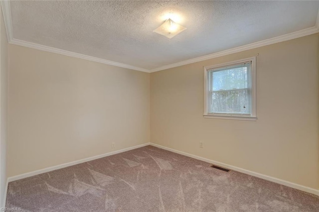 empty room with light carpet, a textured ceiling, and crown molding