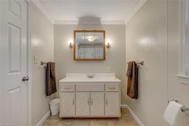 bathroom with vanity and crown molding