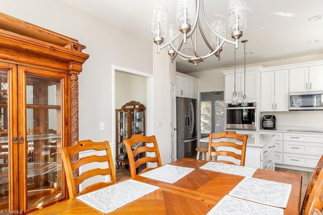 dining room with a chandelier