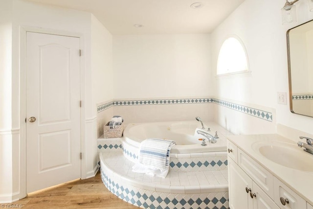 112 Havenwood Dr, Archdale, NC 27263 - bathroom with vanity, a bath, and wood finished floors