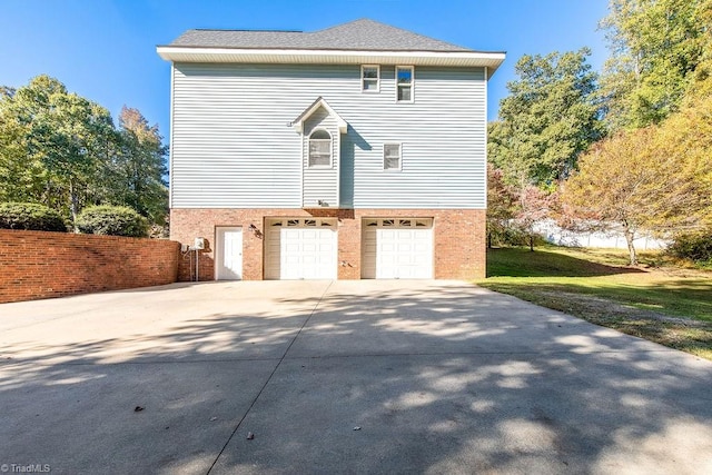 view of home's exterior featuring a garage