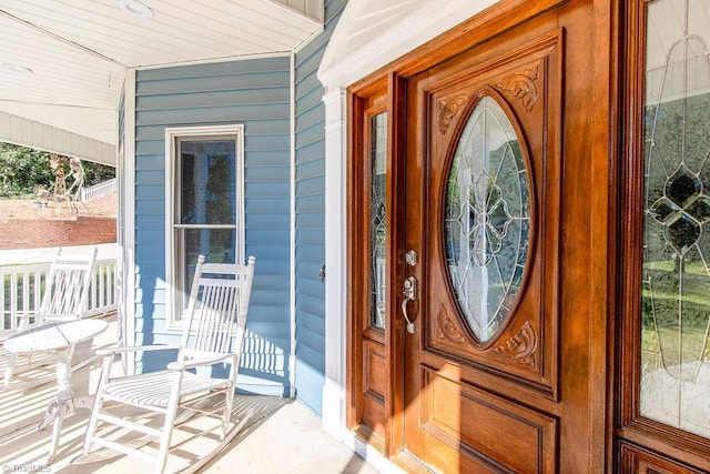 entrance to property with covered porch