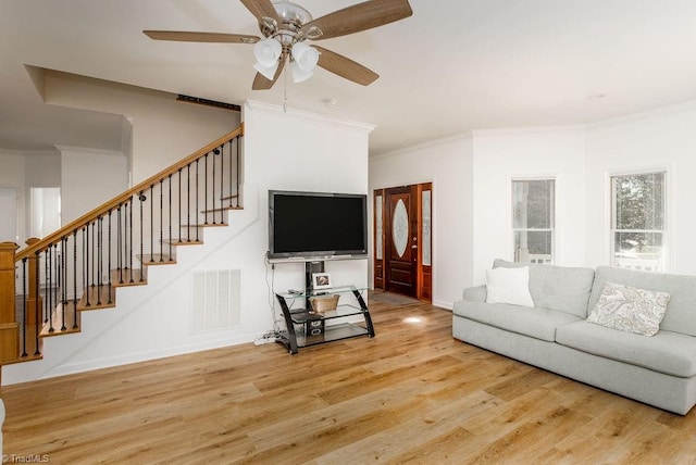 112 Havenwood Dr, Archdale, NC 27263 - living room featuring baseboards, visible vents, stairs, crown molding, and wood finished floors